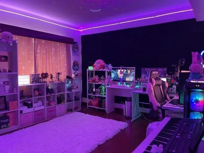 a room filled with lots of furniture and decor in purple lights on the ceiling above