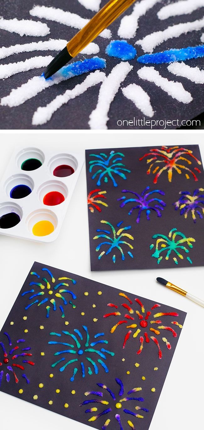 fireworks are painted on black paper with paintbrushes