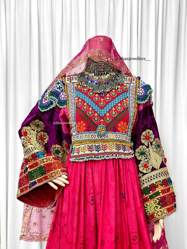 Beautiful afghan dress - traditional bridal afghan dress - Vintage Kuchi tribal Morden Dress - Afghan Dress For Women - Rare find as this is a vintage deess Measurements : UK SIZE 8 - 14 (SIZE MEDIUM ZIP) AND BELT TO ADJUST  Shoulder: 16inch Waist: 20 inch  Body: 15inch Arm length: 23 Material : printed pink Afghan Vintage meterial , and silk material is used for the shalwar, highest quality. - Expect imperfections as this is a vintage item, it has been made with care Hand stitched and perfectly Bohemian Long Sleeve Dress With Motifs, Bohemian Ceremonial Dresses With Motifs, Fitted Bohemian Dabka Choli, Bohemian Style Ceremonial Dupatta With Dabka, Bohemian Choli For Eid, Bohemian Wedding Dress With Motifs, Bohemian Dabka Work Dupatta For Ceremonial Use, Bohemian Ceremonial Dupatta With Dabka Work, Bohemian Dupatta With Dabka Work For Ceremonial Use