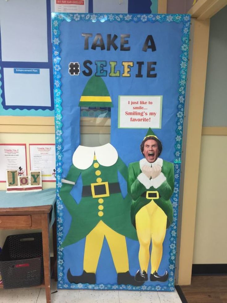 a door decorated with an image of two men in green and yellow costumes, standing next to each other