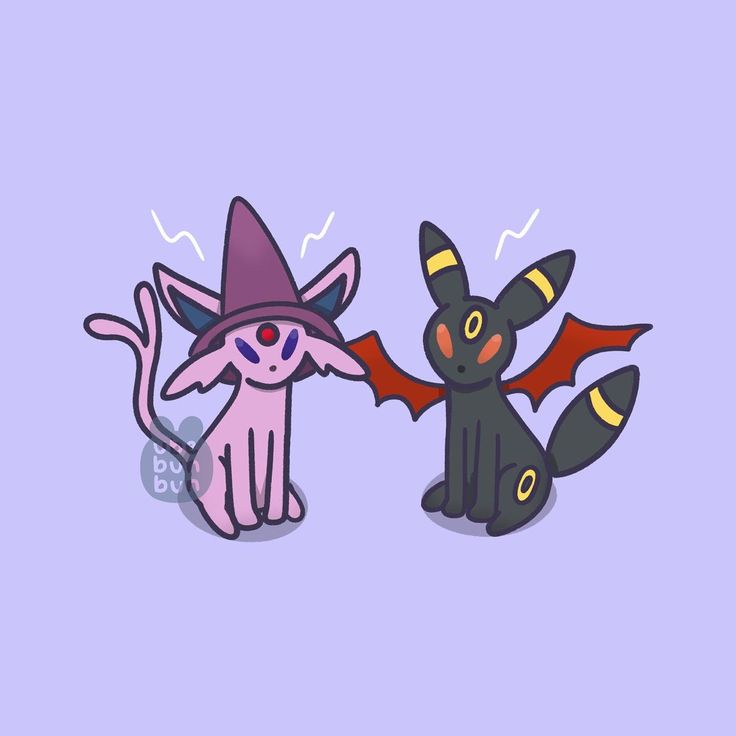 two cartoon cats wearing witches hats and bats