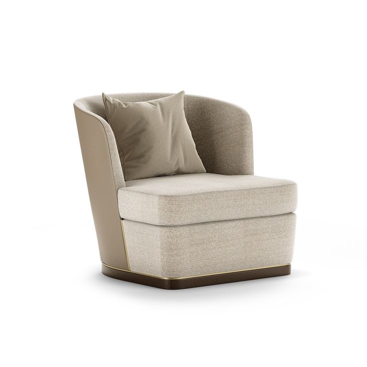 a beige chair with two pillows on the armrests and a pillow in front of it