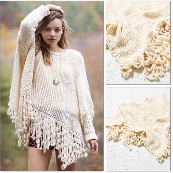 Urban Outfitters Chunky Knit Poncho Urban Outfitters Chunky knit poncho trimmed with braided yarn fringe. In a classic, slip-on square silhouette for an easy style we love. Tag size is one size fits all Brand New With Tag.   Content + Care - Acrylic - Hand wash - Imported Urban Outfitters Sweaters Shrugs & Ponchos White Knit Sweater With Batwing Sleeves, Cream Casual Poncho, One Size Fits All, White Knit Poncho For Fall, Cream Casual Poncho One Size, Bohemian Knit Shawl Sweater, Bohemian Shawl Sweater In Knit, Bohemian Shawl Knit Sweater, White Knitted One-size Poncho, Casual White Knit Poncho