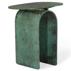 a green metal table with a curved top