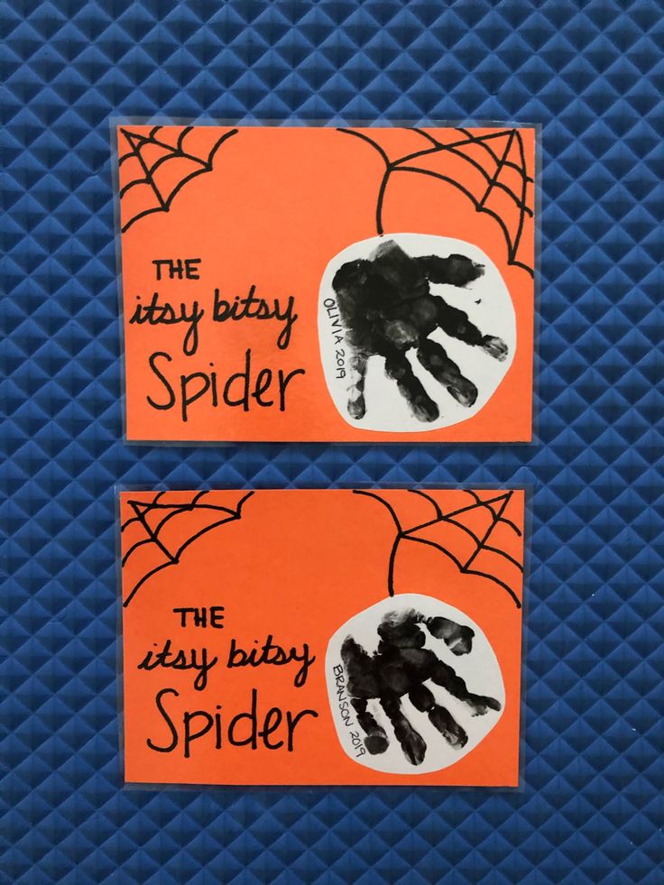 two handprinted cards with the words, the stay baby spider and the itty baby spider