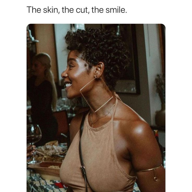 an image of a woman that is smiling and looking at the camera with text on it