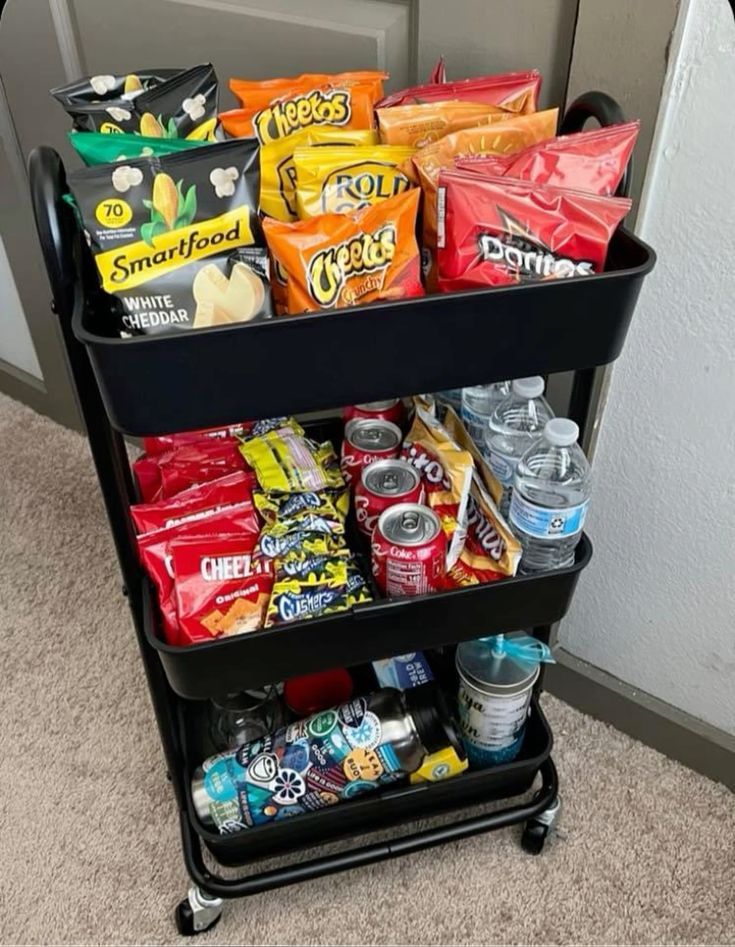 a cart filled with snacks and drinks on the floor