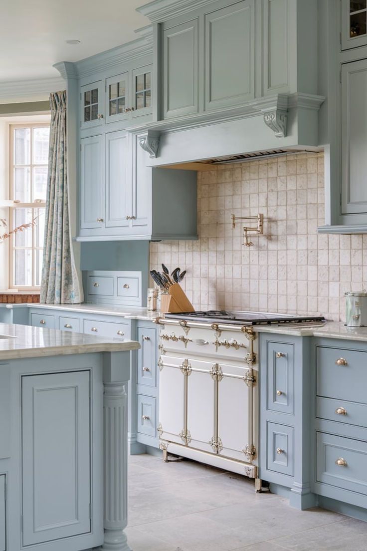 Gray kitchen cabinets with white subway tile backsplash and stainless steel appliances, showcasing a sophisticated, modern style. #CoolToneKitchenCabinets #TheKitchen #KitchenCabinetColorIdeas #SophisticatedDesign Light Gray Countertops, Cabinet Color Ideas, Gray Kitchen Cabinets, Kitchen Cabinet Color Ideas, Kitchen Cabinet Color, Inviting Kitchen, Vibrant Kitchen, Grey Countertops, Gray Cabinets