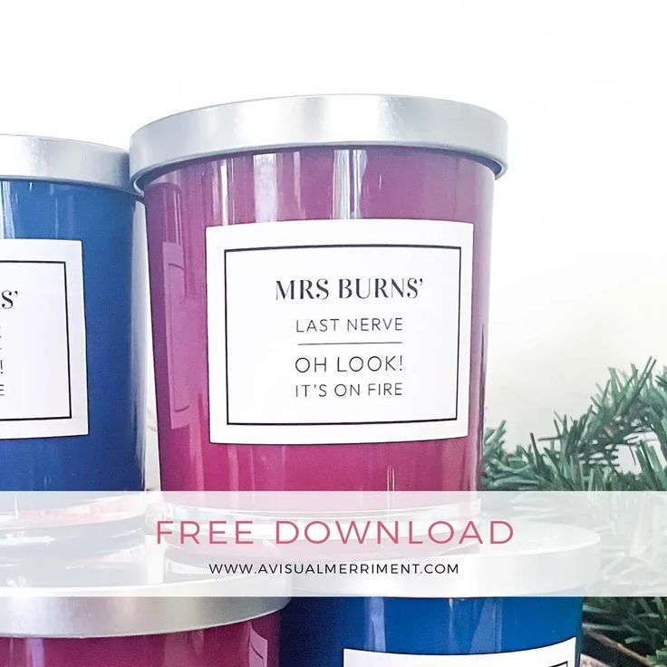 two large candles sitting next to each other with the words, free printable labels on them