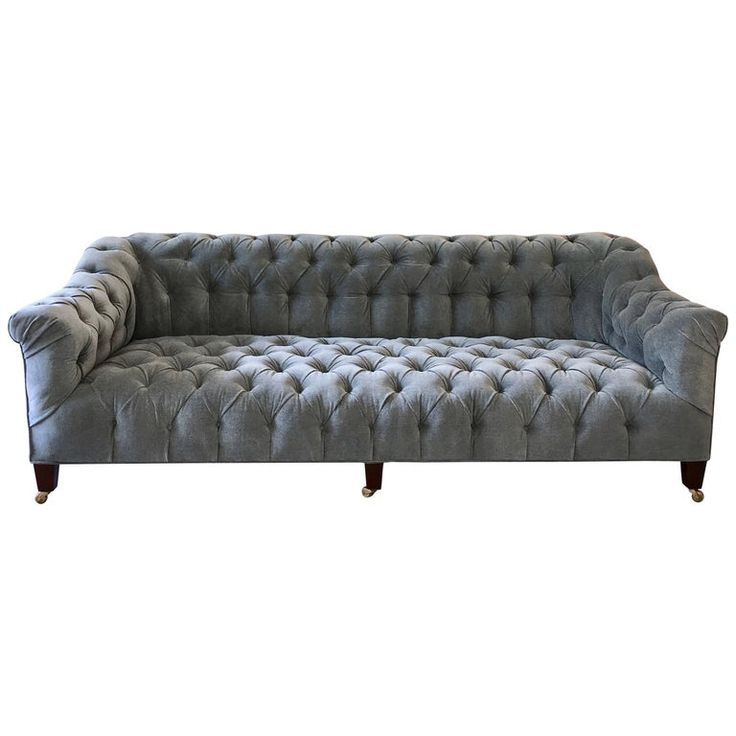 an image of a grey couch on white background