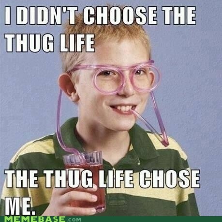 a young boy wearing pink glasses and holding a glass in front of his face with the caption, i didn't choose the thug life chose me