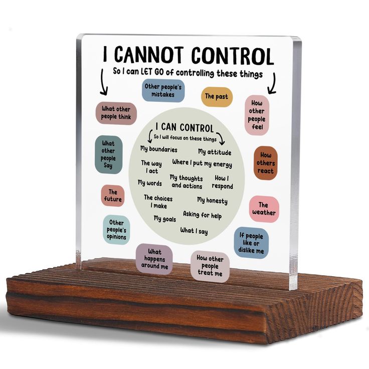 a wooden stand with a glass plaque on it that says, i cannot't control