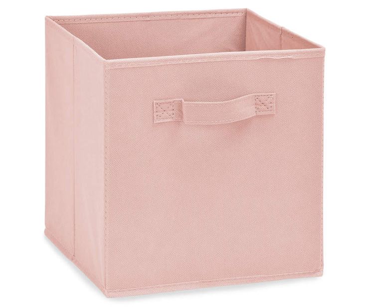 a pink storage bin with handles on the front and bottom, it has a small pocket for