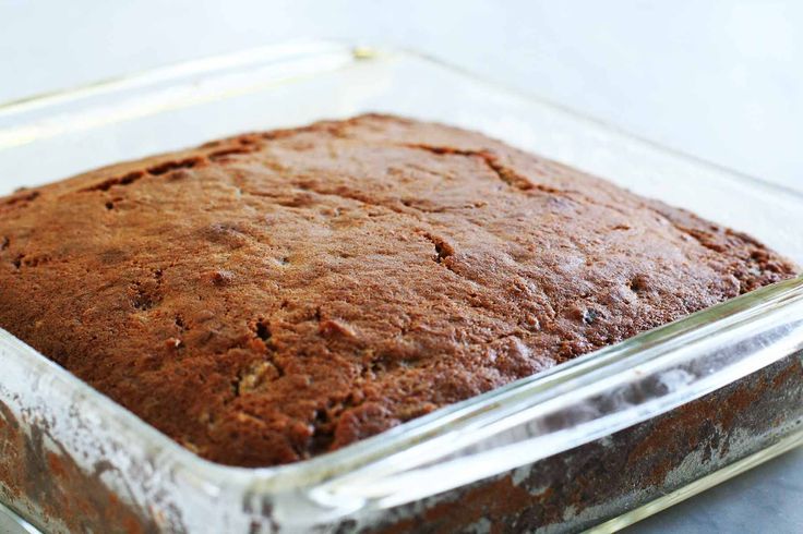 a cake in a glass dish on a counter top with no frosting or icing