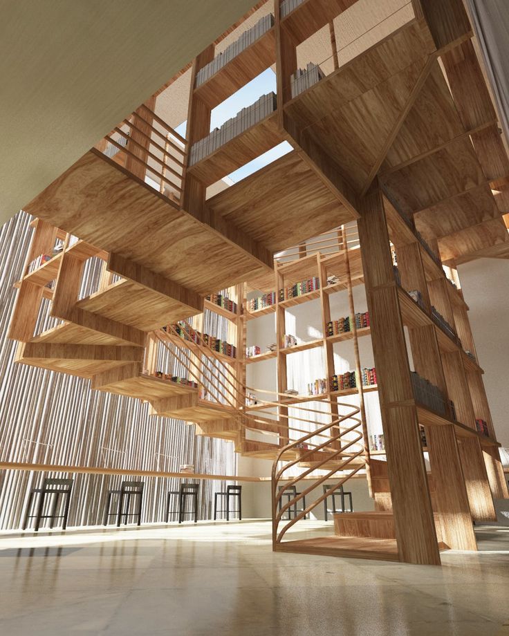 the inside of a building with wooden stairs