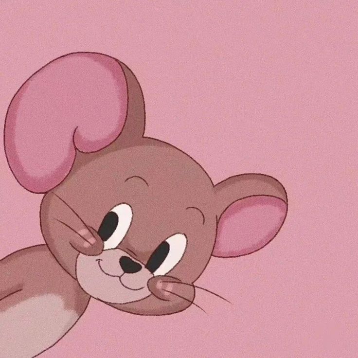 a cartoon mouse with big ears on it's head and eyes wide open in front of a pink background