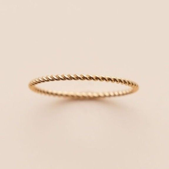 This is a great texture piece. It makes any stack more versatile and beautiful. This twisted look will be great with the solid band or birthstone. Details:Location: Finger (order larger or smaller sizes depending on which finger you choose to wear it)Thickness: 1mmSizes: 5,6,7,8Style: Minimalist/DaintyMade with: 14K Gold Filled Lauren Johnson, Rings Minimalist, Dainty Rings, Twist Ring, Minimalist Ring, Rings For Girls, Minimalist Rings, Dainty Ring, Stackable Rings