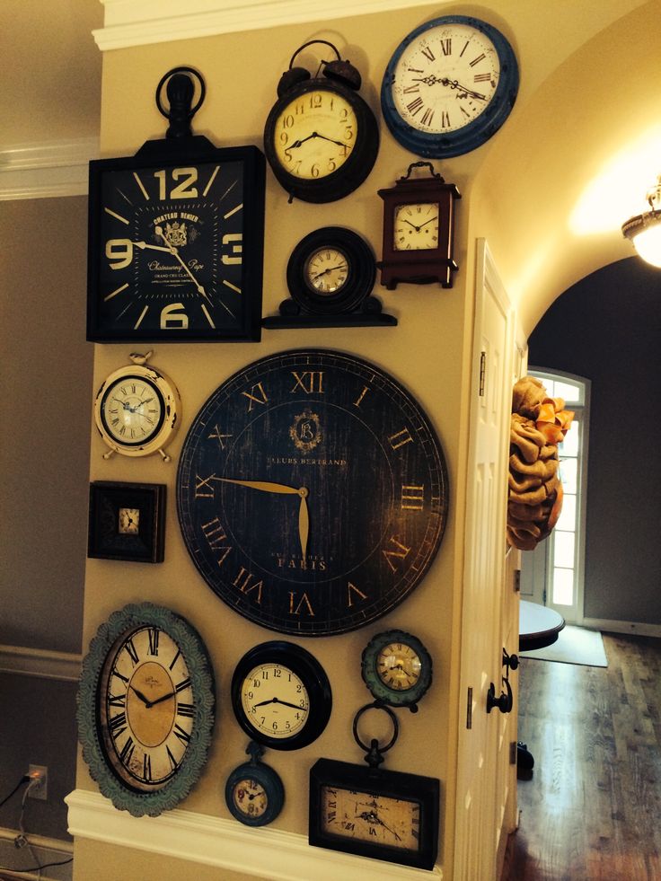 there are many different clocks on the wall