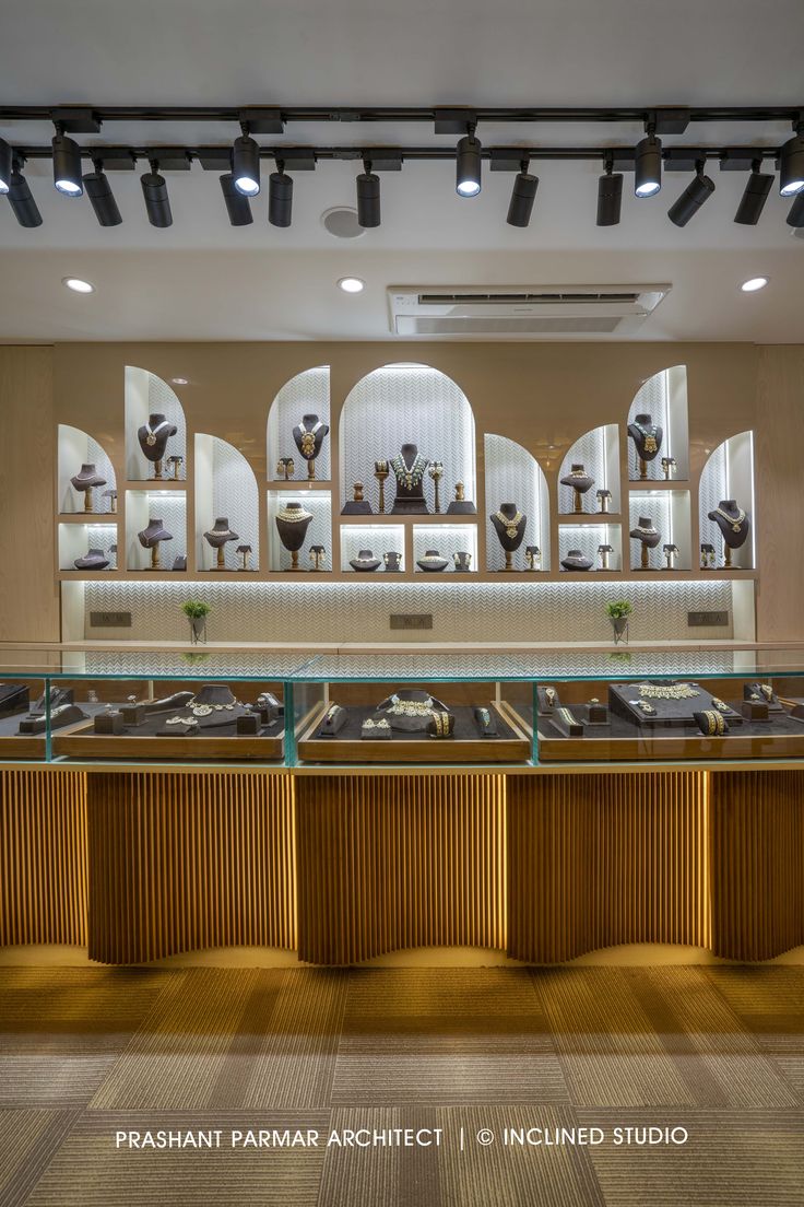 the inside of a jewelry store with lots of counter space