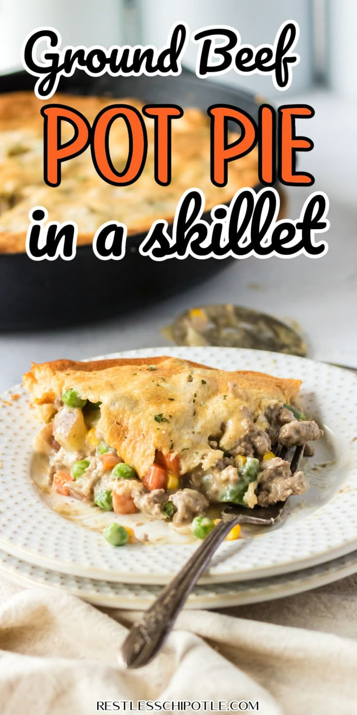 a white plate topped with a slice of ground beef pot pie in a skillet