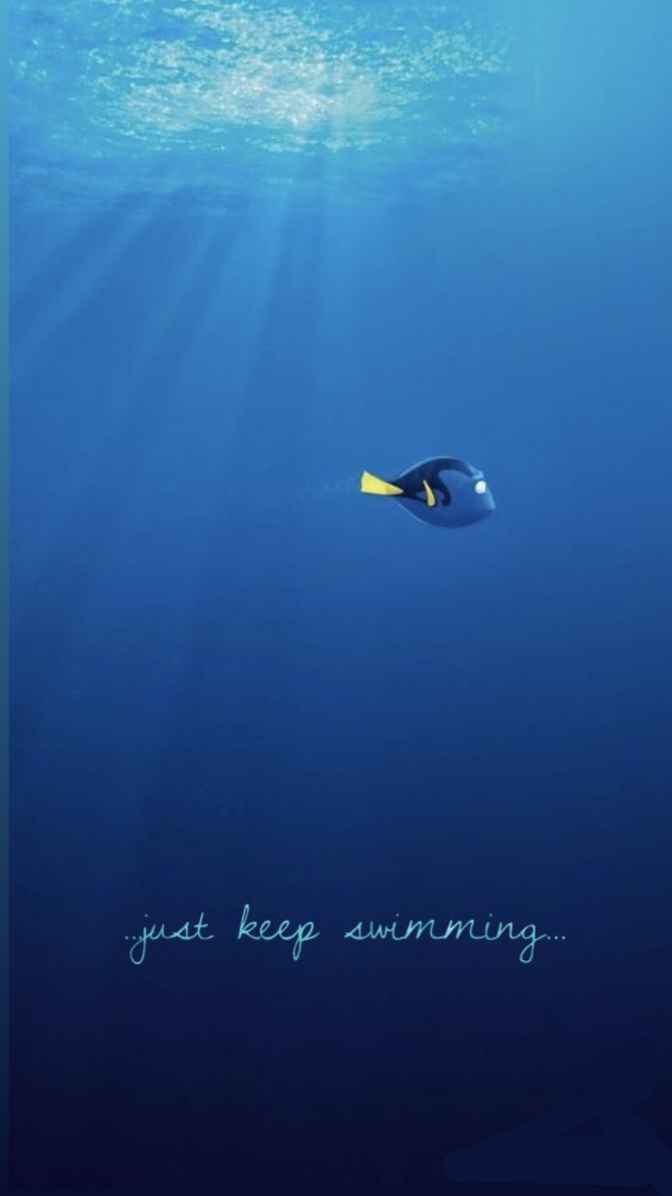 a blue and yellow boat floating in the ocean next to an underwater message that reads, just keep swimming