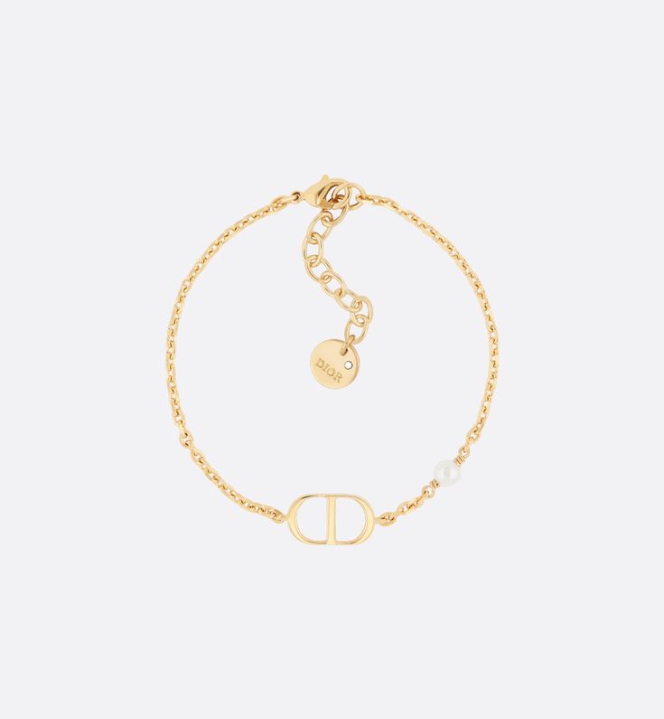 Petit CD Bracelet Gold-Finish Metal with a White Resin Pearl | DIOR Bracelet Cd, Dior Bracelet Gold, Cd Bracelet, Bracelet Dior, Christian Dior Jewelry, Christian Dior Bracelet, Dior Bracelet, 24 Birthday, Dream Items