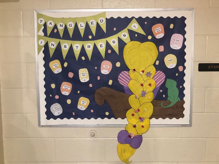 a bulletin board with yellow flowers on it