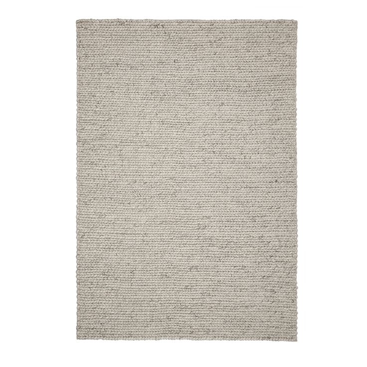 a white rug on a white background