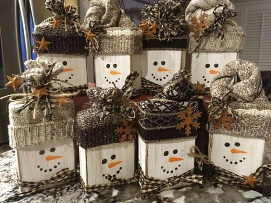 snowmen are wrapped in burlap and tied with twine