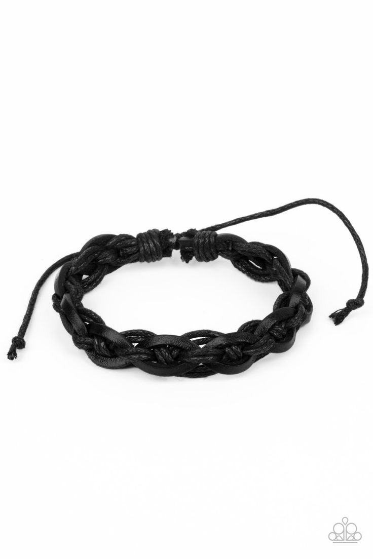 Knotted strands of black cording and black leather laces weave across the wrist, creating a rugged braid. Features an adjustable sliding knot closure. 5/13/21 Casual Black Resizable Braided Bracelets, Adjustable Black Metal Braided Bracelet, Luxury Adjustable Black Braided Bracelet, Bohemian Black Multi-strand Bracelets, Adjustable Black Hand-strung Braided Bracelet, Sliding Knot Closure, Lace Weave, Bracelet Knots, Black Bracelets