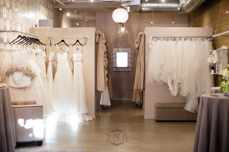 the bridal gowns are on display in the store's showroom,