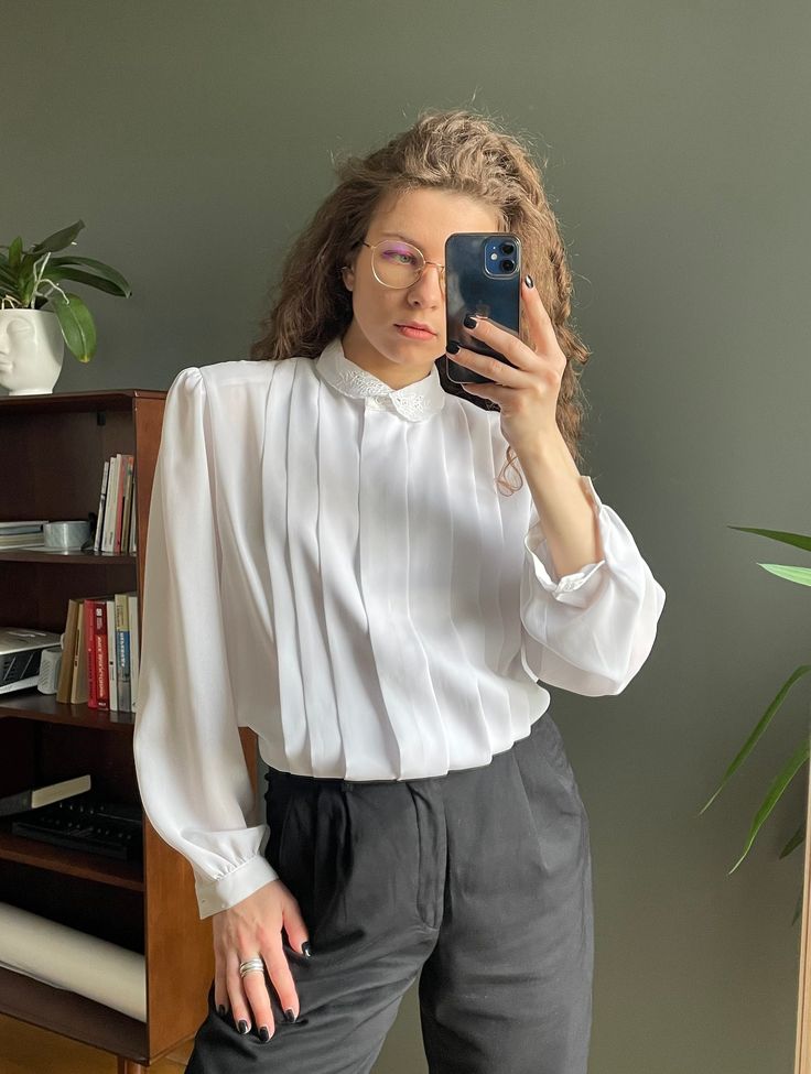 "Vintage 80s pleaded blouse in white, padded, made of polyester, fits XS - M, decorated with stunning elements, collar, button closure, very light, suits for formal and informal events, loose fit, perfect condition Measurements  shoulders 43 cm / 16.9\" sleeve 61 cm / 24\" length 68 cm / 26.8\" bust from armpit to armpit 58 cm / 22.8\"" White Pleated Sleeves Blouse For Office, Fitted White Blouse With Pleated Sleeves, White Pleated Sleeve Blouse For Work, Chic White Pleated Blouse, Formal White Blouse With Pleated Sleeves, White Blouse With Pleated Sleeves For Work, White Formal Top With Pleated Sleeves, Formal White Top With Pleated Sleeves, White Pleated Formal Top