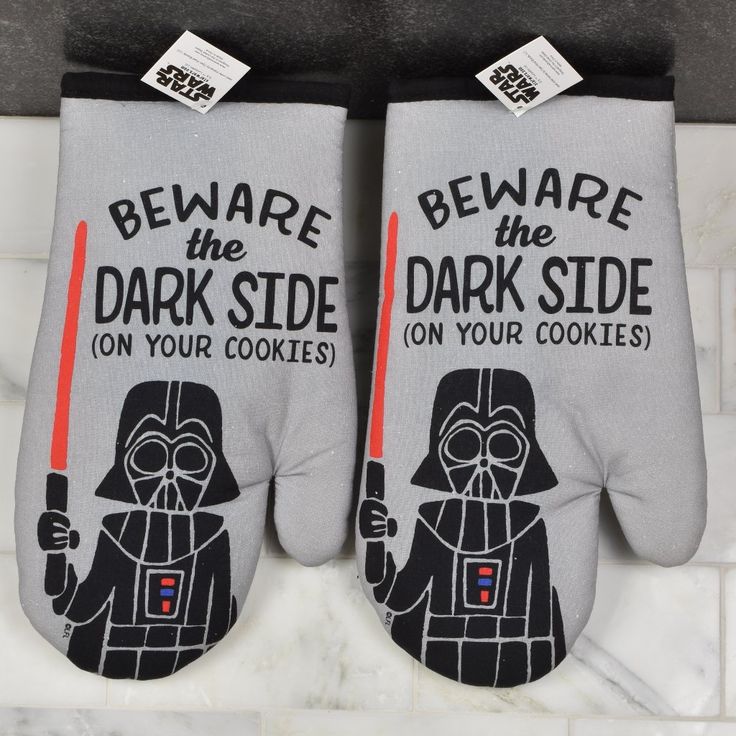 two oven mitts that say, beware the dark side on your cookies