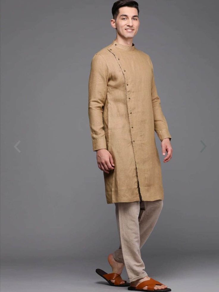 "WELCOME TO MY SHOP STYLEASHRA Give yourself a best ethnic look by wearing this Top / kurta pajama  Made of rich cotton blend fabric this regular-fit set comprises a full-sleeved Indian Long kurta/ kurta This outfit with mojris will look apart on special occasions. material l :100%Cotton Color : Brown Length : 40 inch Shirt Chest is measurement for shirt (not body) As per standard, for best loose fitting 5\" inches gap should be there between actual chest size and shirt chest size Size chart is below Men's Sizes Actual Body Chest - Ready Shirt Chest i Add 5\" Inches Lose Fitting Fabric Armhole To Armhole. XS - 31\" Inches 36\" Inches S - 35\" Inches 40\" Inches M - 37\" Inche 42\" Inches L - 39\" Inches 44\" Inches XL - 43\" Inches 48\" Inches 2XL - 47\" Inches 52\" Inches 3XL - 51\" Inche Designer Linen Kurta For Eid, Spring Fitted Dabka Sherwani, Summer Handloom Long Sleeve Kurta, Spring Sherwani With Dabka On Straight Kurta, Traditional Linen Kurta For Eid, Unstitched Kurta With Traditional Drape For Spring, Eid Linen Long Sleeve Sets, Linen Long Sleeve Sets For Eid, Spring Kurta With Dabka In Traditional Drape