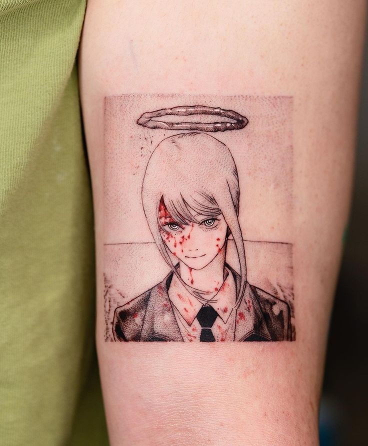 a woman's arm with a tattoo on it that has an angel above her head