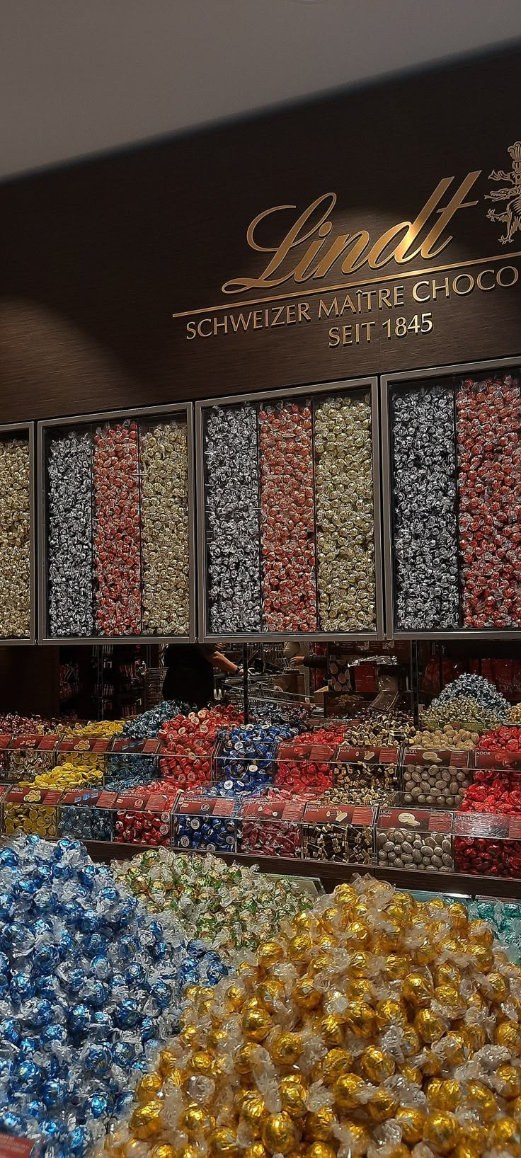 many different types of candies are on display