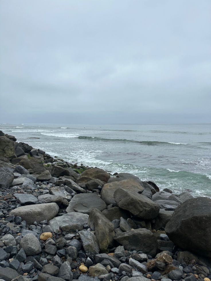 San Diego coast, west coast, ocean beach, cloudy, june gloom, cloudy aesthetic, windy, rocks, coastline, beach Ocean Rocks Aesthetic, Cloudy Ocean Aesthetic, Cold Ocean Aesthetic, Rock Beach Aesthetic, Cold Summer Aesthetic, Foggy Beach Aesthetic, Cloudy Beach Aesthetic, Coastline Aesthetic, Cold Beach Aesthetic