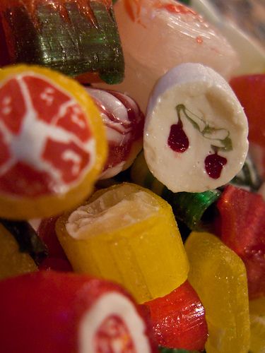 a close up view of some fruit and candy