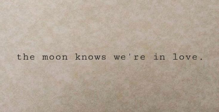 an old typewriter with the words, the moon knows we're in love