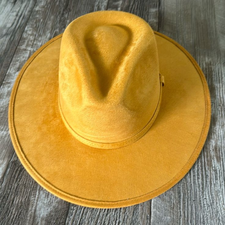 Beautiful Suede Fedora Hat Mustard! This Hat Its A Beauty!! The Color And Style Just Perfect! My Favorite Color! New, It Was A Gift From My Mother But Doesnt Fit Me. Big For Me. Size: Medium Made In Mexico Color: Mustard Gold Fedora Hat For Winter, Classic Gold Fedora With Short Brim, Gold Fedora With Flat Brim For Fall, Gold Flat Brim Fedora For Fall, Fall Gold Fedora With Flat Brim, Gold Flat Brim Hats For Winter, Gold Brimmed Hat For Fall, Gold Wide Brim Hat For Fall, Yellow Fedora Hat For Fall