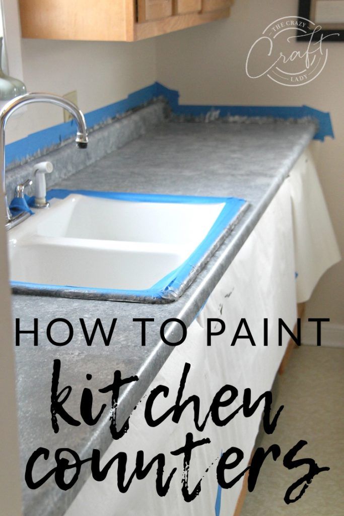 a kitchen counter with blue tape on it and the words how to paint kitchen counters