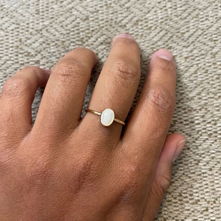 Mother of Pearl : symbolizes good luck and prosperity. Metal: Sterling Silver or 14K Gold Filled Stone: Mother of Pearl cabochon 8 x 6 mm