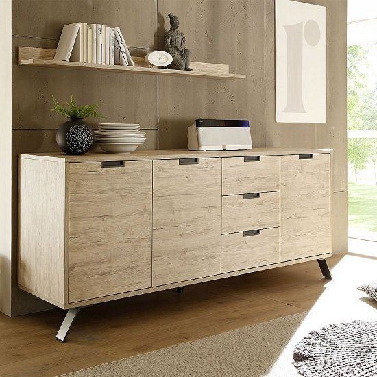 a large wooden cabinet with drawers and shelves