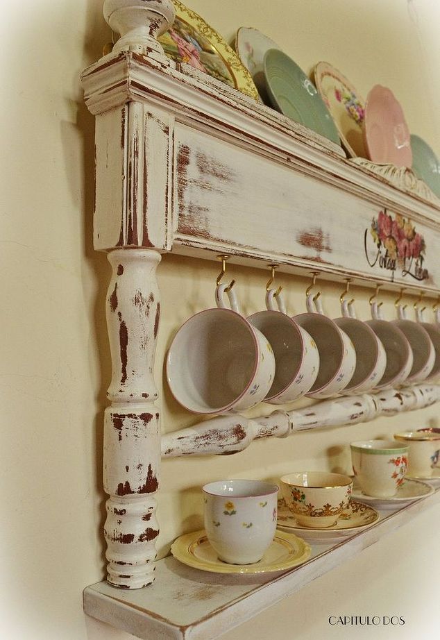 a shelf with plates and cups on it