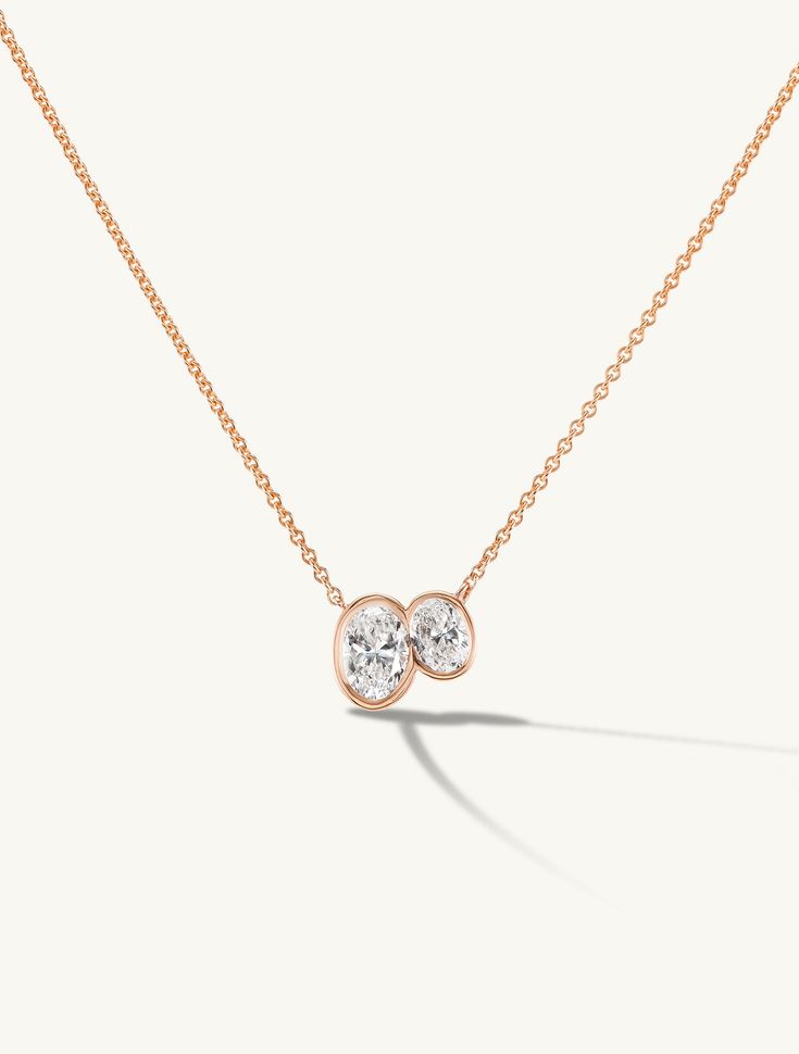 Details When Two become one. Two oval cultivated diamonds set in a solid 14k gold bezel attached to a delicate cable chain with a lobster clasp. Measurements Carat: .9 Chain Length: 18" w/ 16" option Height: 8mm Width: 10mm Shipping Each piece of jewelry is carefully hand fabricated to order so please allow 3-4 weeks for production if not in stock. If you would like to request a rush order please contact the studio at customerservice@sophieratner.com. Selecting faster shipping will apply to cour Luxury Oval Necklaces For Valentine's Day, Luxury Oval Hand-strung Necklaces, Luxury Oval Pendant Rings For Formal Occasions, Luxury Everyday Oval Pendant Jewelry, Luxury Drop Jewelry With Detachable Pendant, Luxury Exquisite Necklace With Detachable Pendant, Luxury Fine Jewelry Pendant Locket Necklace, Luxury Oval Pendant Diamond Necklace With Accents, Luxury Gift Oval Pendant Earrings