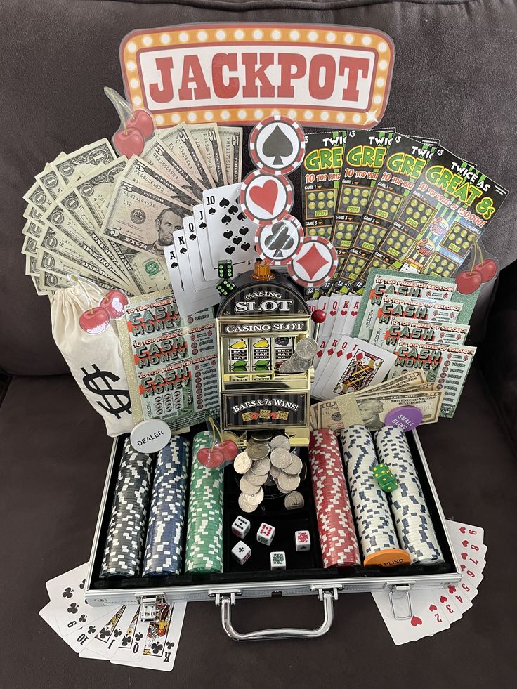 an open suitcase filled with lots of cards and poker chips on top of a couch