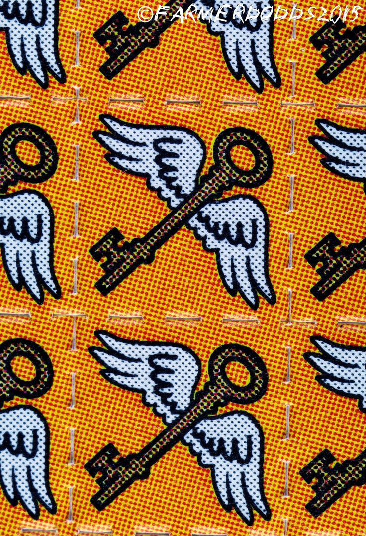 an image of keys with angel wings on orange background in the style of vandalism