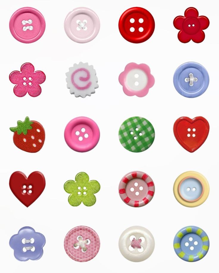 many different types of buttons are shown in this image, including one with flowers and two with hearts