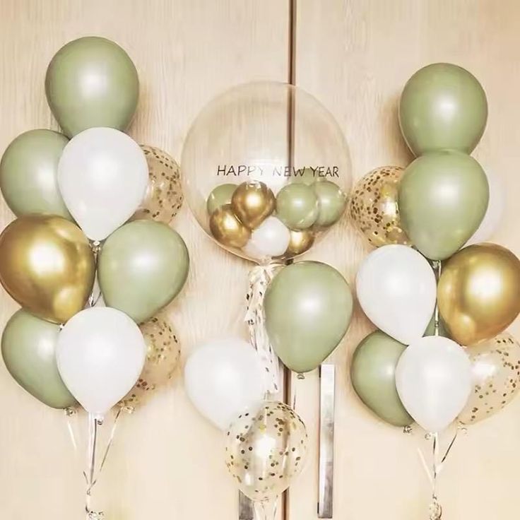 a bunch of balloons that are on a table