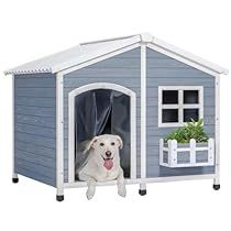 a dog house with a white dog in it